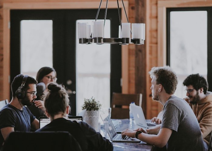 Colleagues working together in a modern office