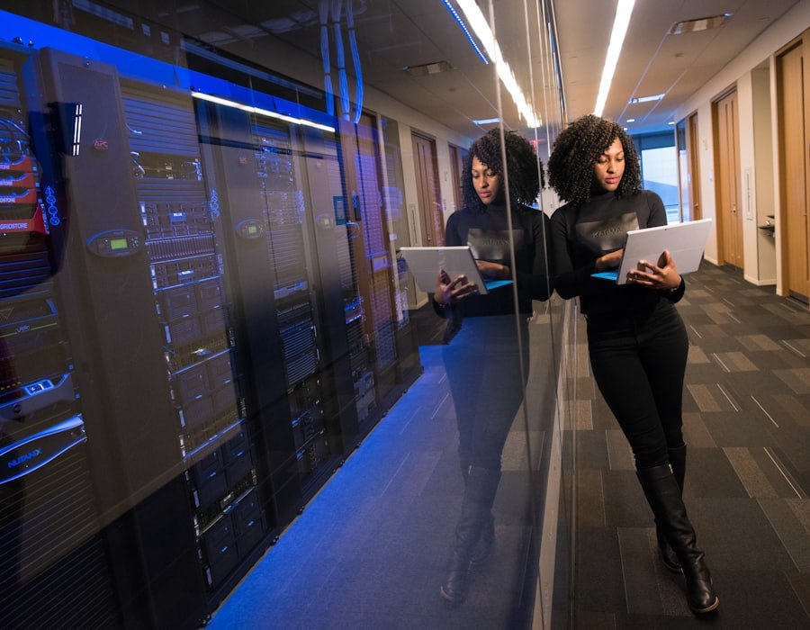 Support specialist wearing a headset while working at a computer